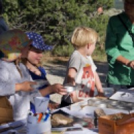 Young participants exploring the SEED Sensorium with Katie Woodall, of SEED Taos